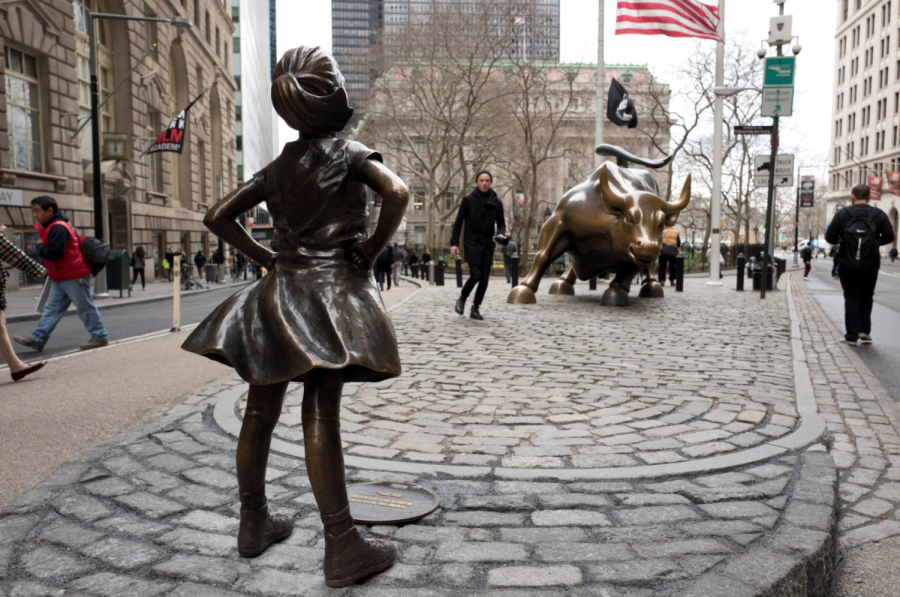 A statue titled “Fearless Girl” faced the Wall Street bull on Wednesday in New York. 