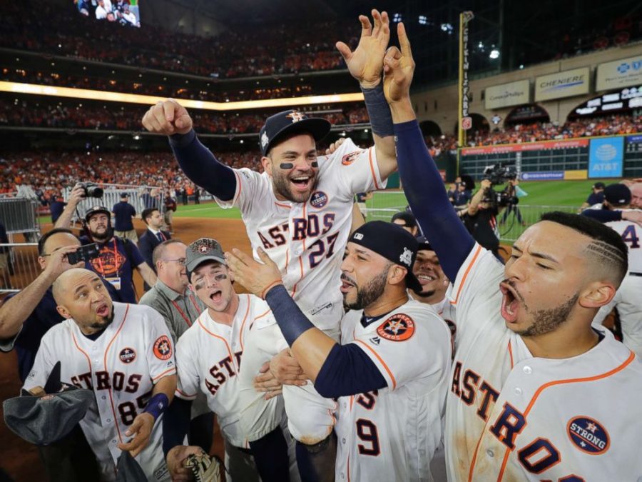 Houston Astros Jose Altuve is lifted by teammates after Game 7 of baseballs American League Championship Series against the New York Yankees in Houston.