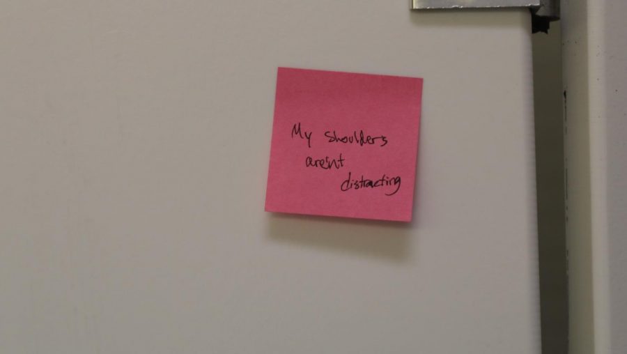 A sticky note with a message from the student-led protest in August 2021. 