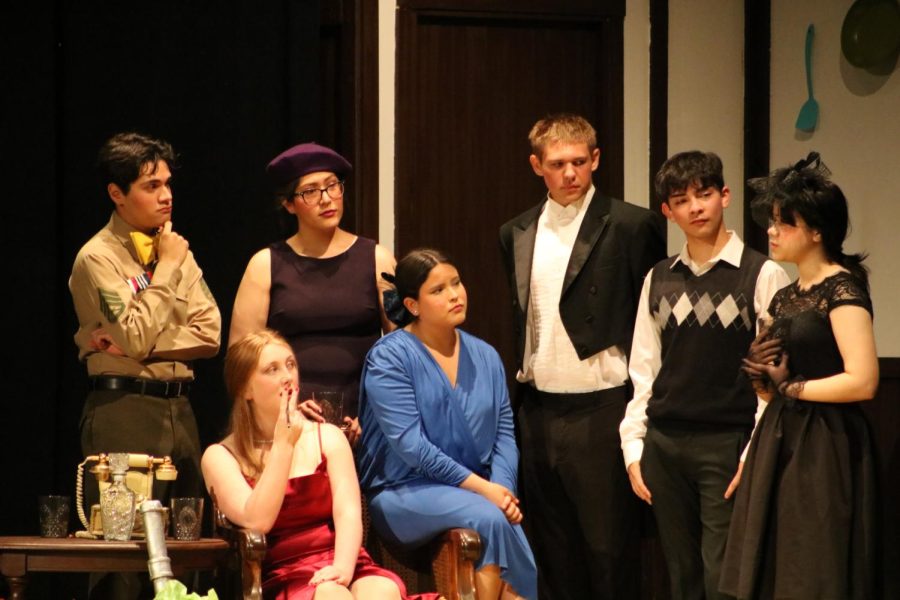 Main characters of the play gather as their blackmail is exposed to the rest of the group.